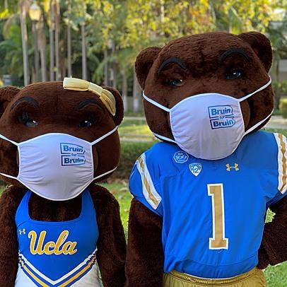 Joe and Josie Bruin wearing masks