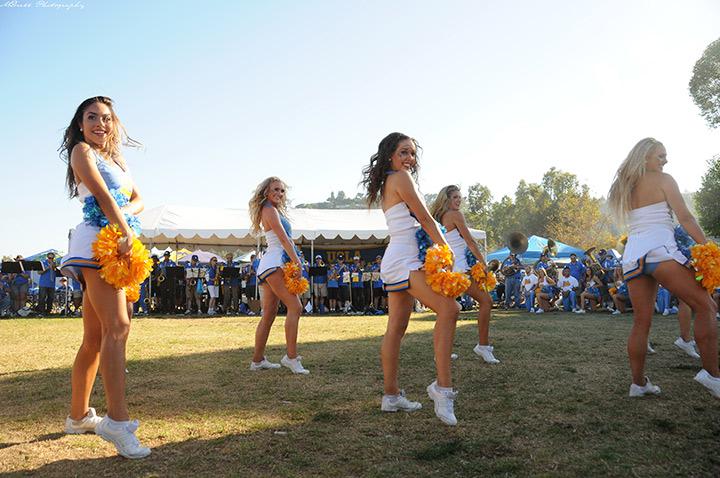 the 2014 Squad performing before a football game