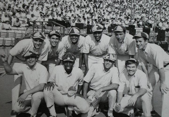 the 1967 Yell Crew on the field before a football game