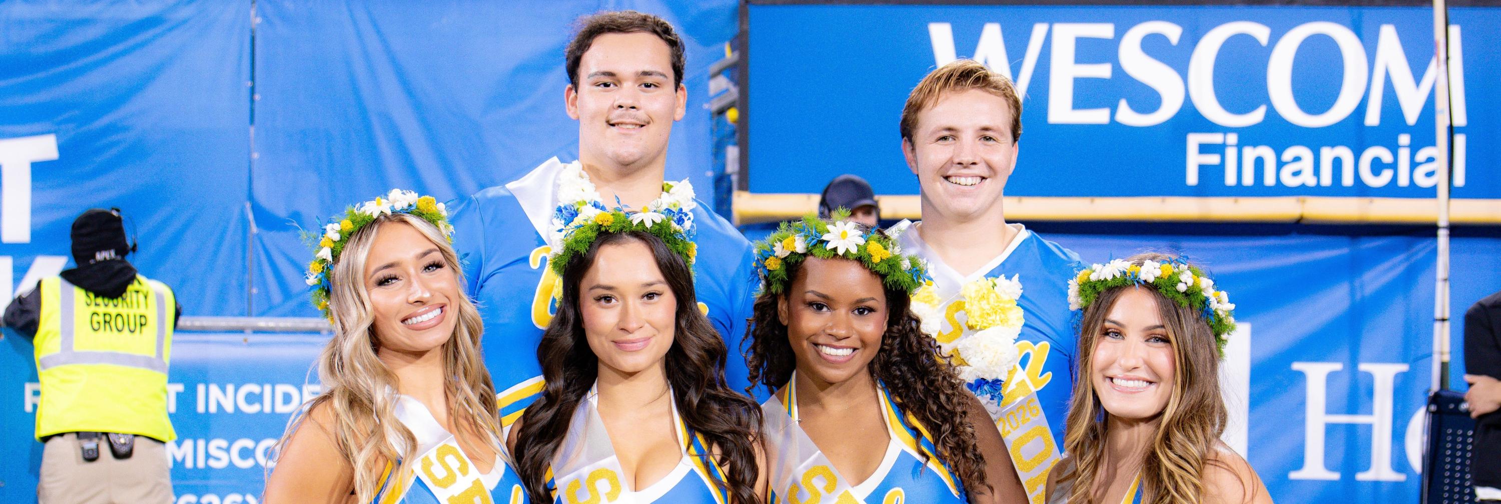Members of the UCLA Cheer Squad on the field at the Rose Bowl
