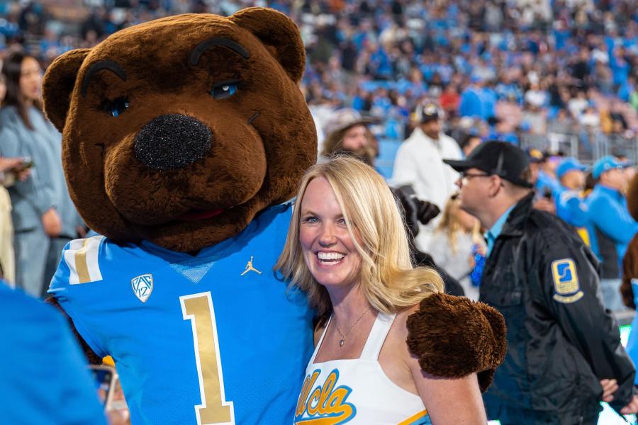 Squad alumna with Joe Bruin