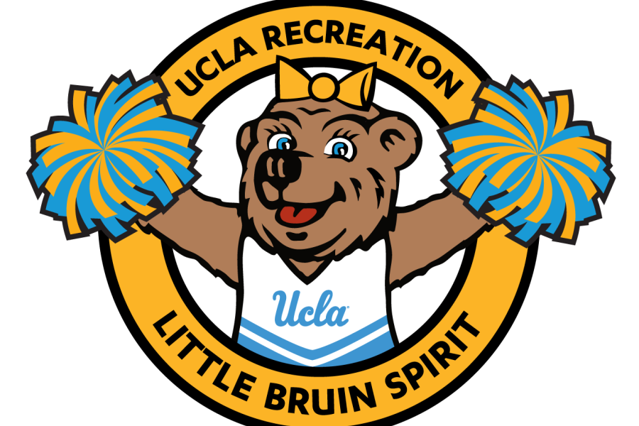 Blue and yellow Little Bruin Spirit program logo featuring a young Josie Bruin in a cheerleading uniform with blue and yellow pom poms